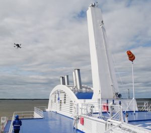 Explicit ApS uses a drone to measure methane emissions in the exhaust plume of a ship while TNO measures in the exhaust stack from the engine room. Photo: Explicit ApS.