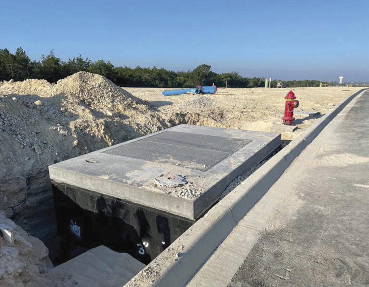 The valve station came complete with custom cement cover and access points. The valve station came complete with custom cement cover and access points.