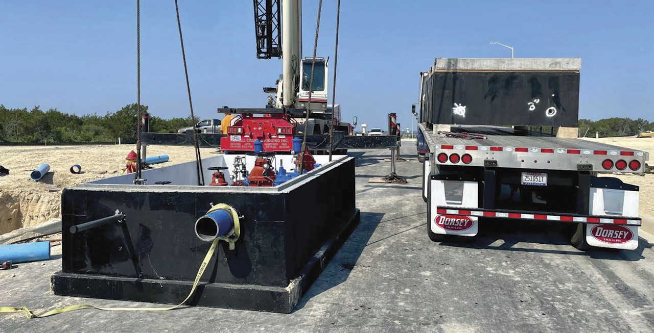 Pre-packaged valve station lifted off the truck. Pre-packaged valve station lifted off the truck.